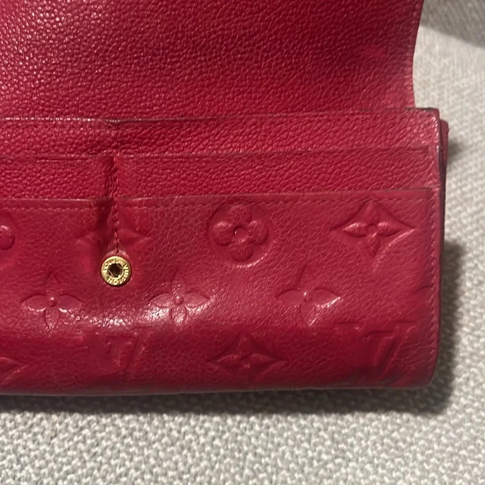 Authentic Louis Vuitton Empriente Sarah wallet raspberry color CA1183